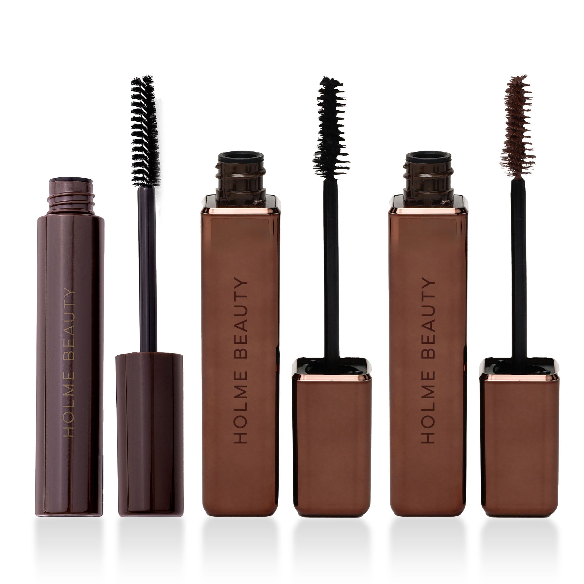 Set of Holme Beauty mascara bottles on a white background